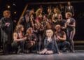 Sarah Soetaert (Roxie Hart) - centre seated - with the cast of CHICAGO, credit Tristram Kenton
