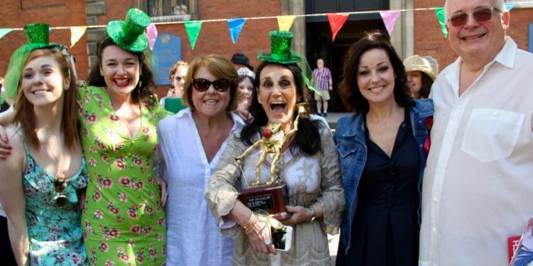 West End Bake Off Winners, Leslie Joseph and Young Frankenstein Company with Wendi Peters, Ruthie Henshall and Christopher Biggins. Photo credit Mark Lomas