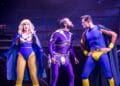 Eugenius Emily Tierney as Carrie, Neil McDermott as Evil Lord Hector and Simon Thomas as Gerhard Photo Scott Rylander