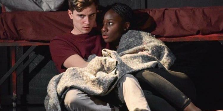 Billy Harris as Callum and Heather Agyepong as Sephy Noughts and Crosses Photo by Robert Day
