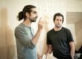 l r Scott Karim and Bijan Sheibani Director in rehearsals for The Arrival. Photo by Marc Brenner REH