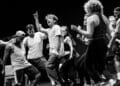 Olly Dobson centre and the company in rehearsals for Back to the Future The Musical credit Sean Ebsworth Barnes