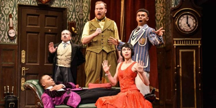 The Company of The Play That Goes Wrong at the Duchess Theatre. Photo credit Robert Day