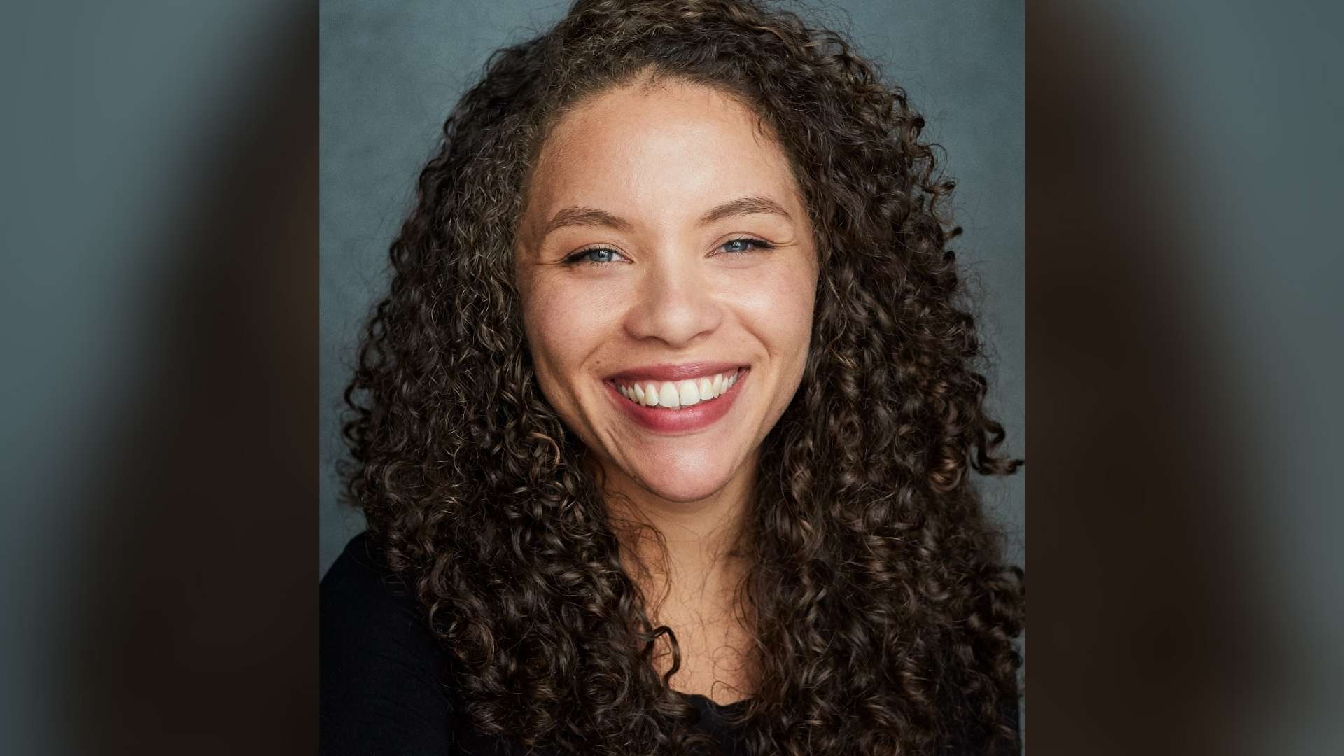 Saffron Coomber in a thoughtful pose for a theatrical interview