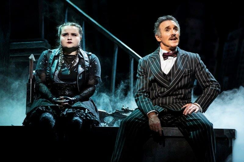 Kingsley Morton as Wednesday Addams Cameron Blakely as Gomez Addams in THE ADDAMS FAMILY. Credit Pamela Raith