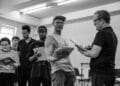 John Partridge centre and the cast in rehearsals for The Witches of Eastwick credit Danny Kaan