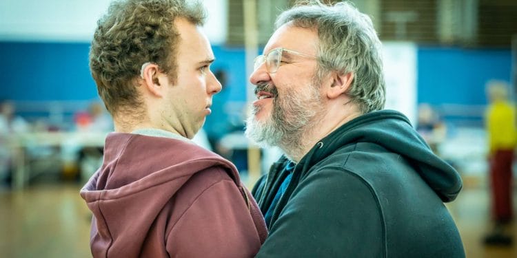 Maximilian Fairley Harry and Mark Benton Kevin in rehearsals for Village Idiot. Credit Marc Brenner