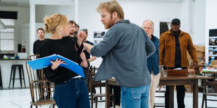 Milly Alcock, Brian Gleeson and the cast of The Crucible in rehearsals. Credit Helen Murray