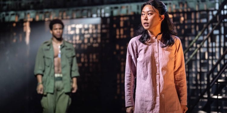 Jessica Lee (Kim and Alternate Mimi) and Christian Maynard (Chris) in Miss Saigon. Photo by Johan Persson