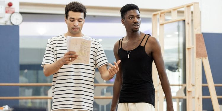 Raphael Akuwudike (Ste) and Joshua Asaré (Jamie) in rehearsals for Beautiful Thing at Stratford East. Photographer The Other Richard