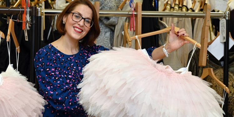 Rachael Magson Director of Development Birmingham Royal Ballet pictured in BRB wardrobe against Sleeping Beauty costumes credit Phil Hitchman