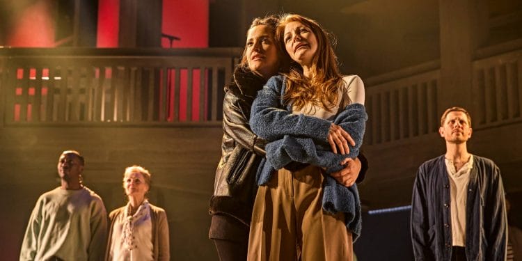 Lauryn Redding as Nikki, Laura Pitt Pulford as Poppy and the cast of Standing at the Sky's Edge in the West End. Credit Brinkhoff Moegenburg