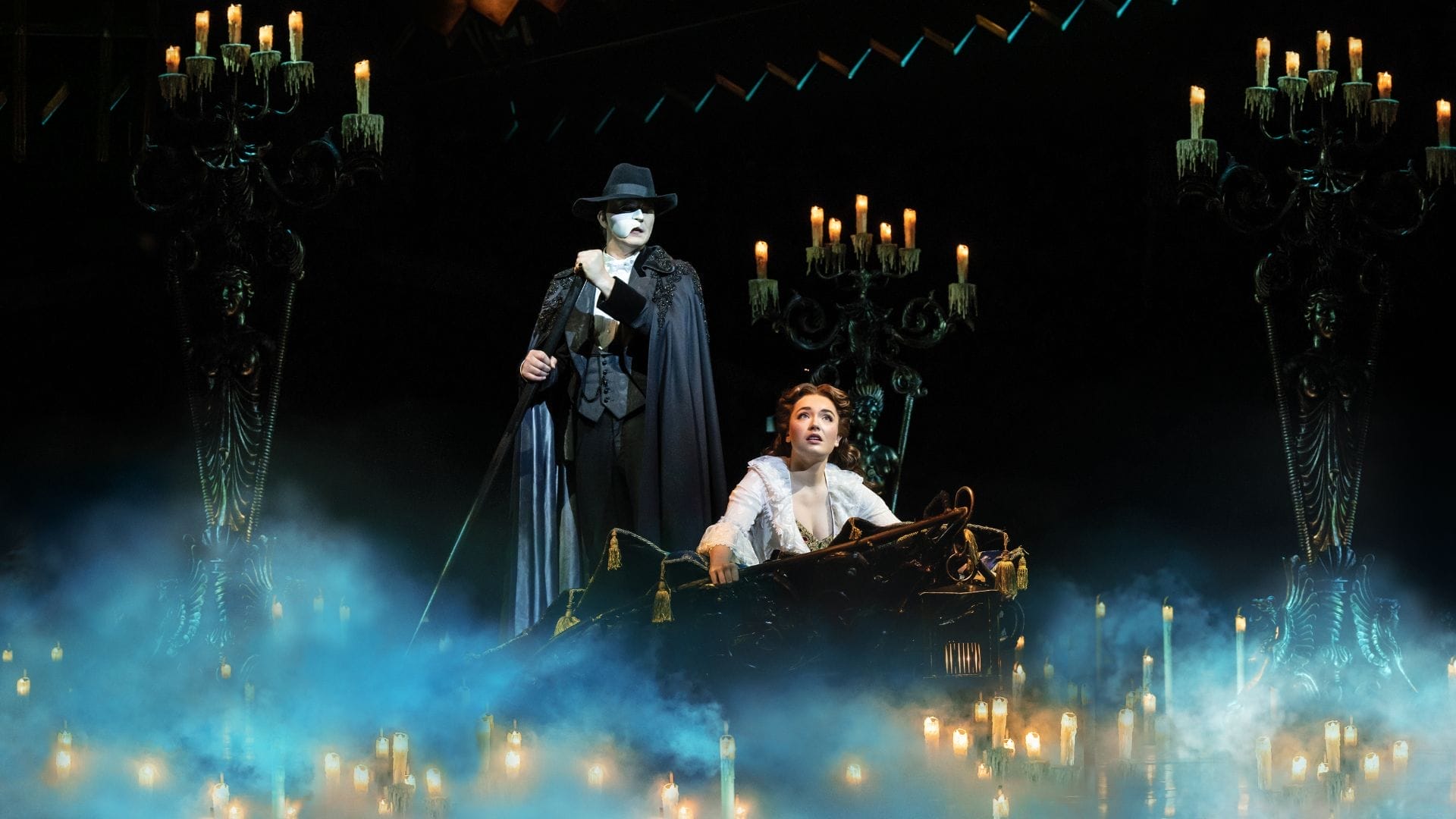 THE PHANTOM OF THE OPERA. Dean Chisnall as The Phantom and Lily Kerhoas as Christine. Photo by Johan Persson